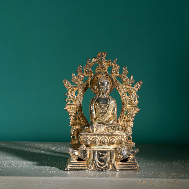 Handcrafted metal enlightened ascetic idol with an antiqued aureole for a meditation room centerpiece or spiritual housewarming gift.