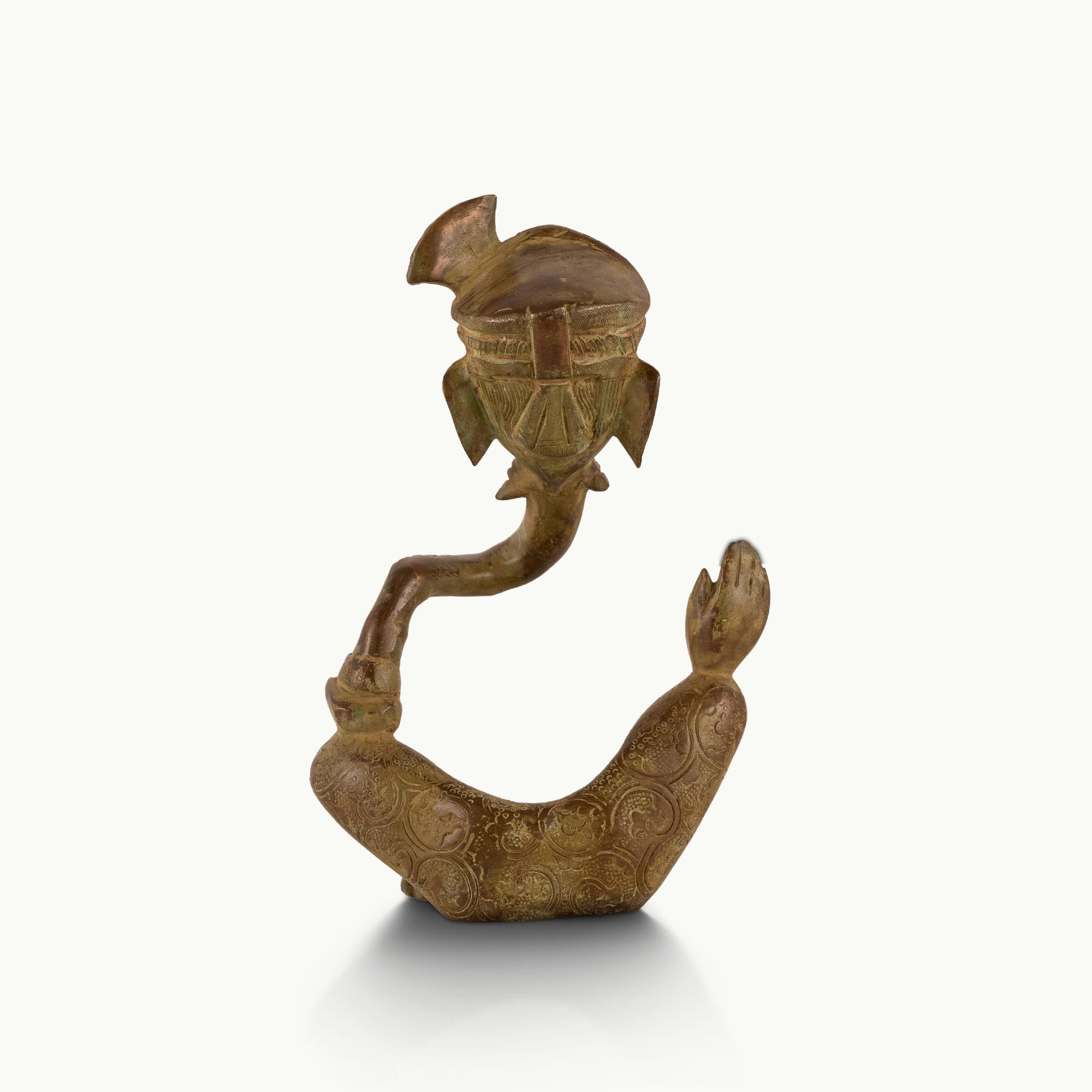 Antique abstract brass ganesha in meditative pose with turban