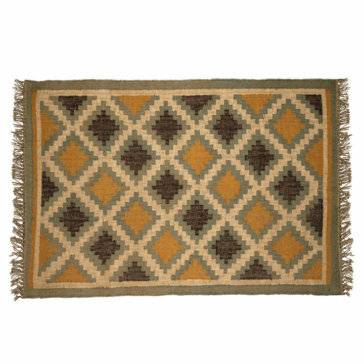 Floral flatweave cotton wool kilim in a living room, showcasing geometric roses on a black canvas. 