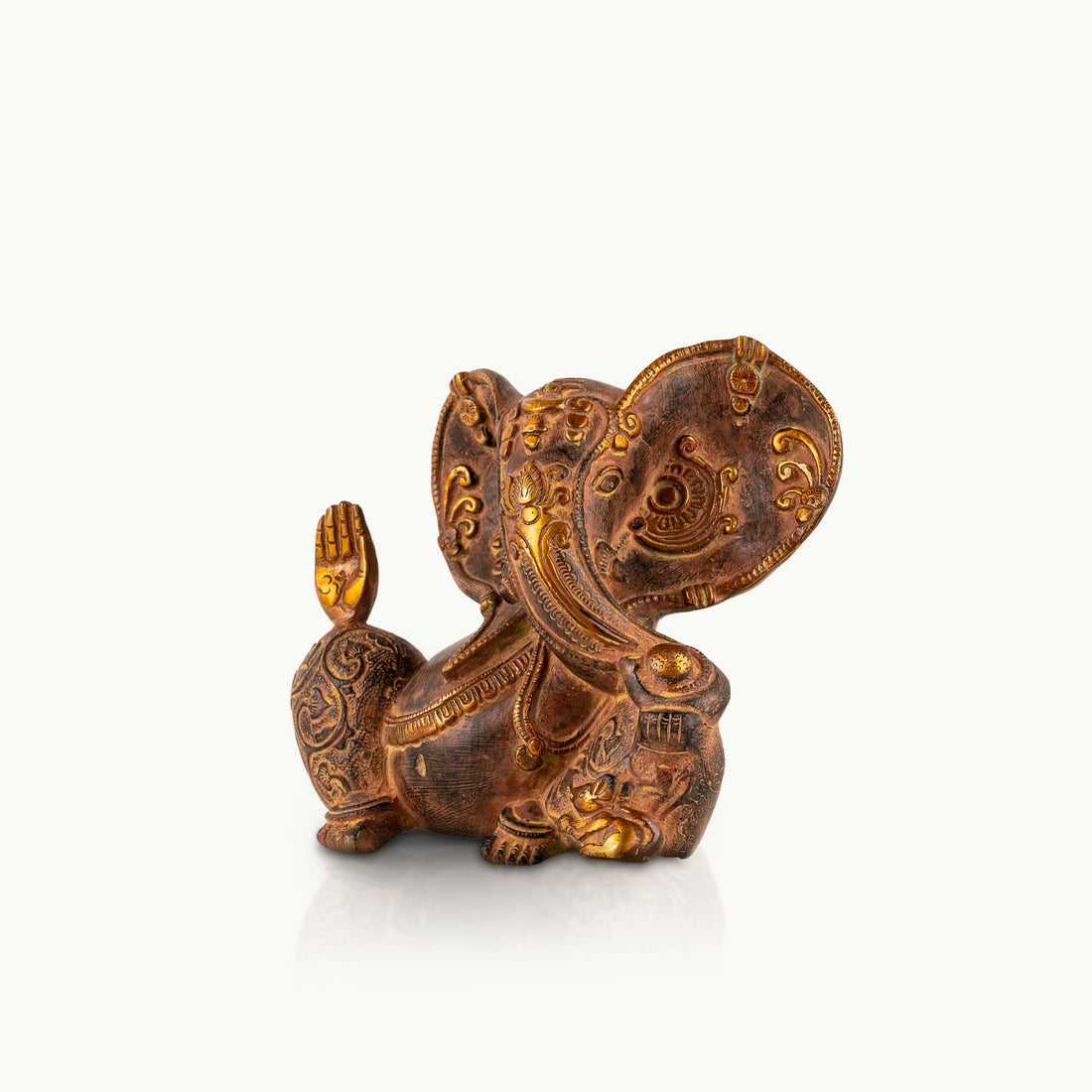 Premium metal Ganpati idol displaying the protective Abhaya mudra for an entryway console or 