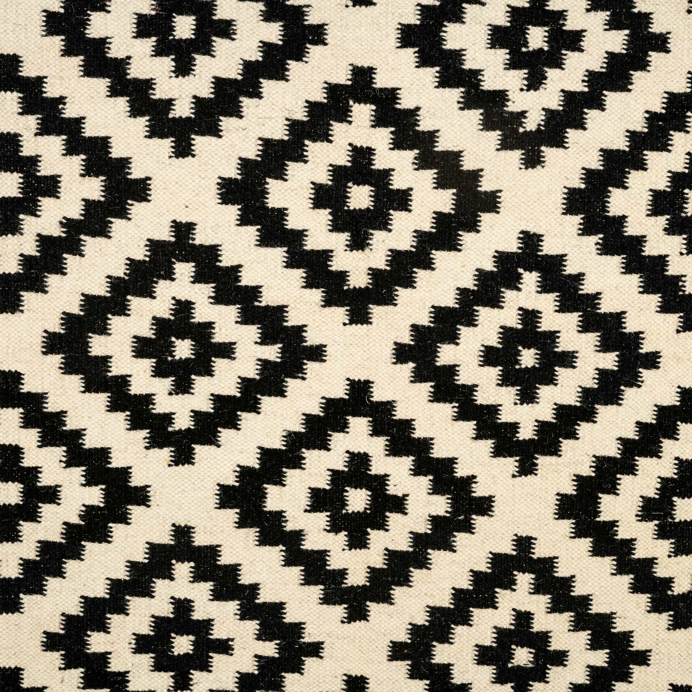 Handwoven Cotton Wool Rug – Black and Ivory Diamond Geometric Pattern