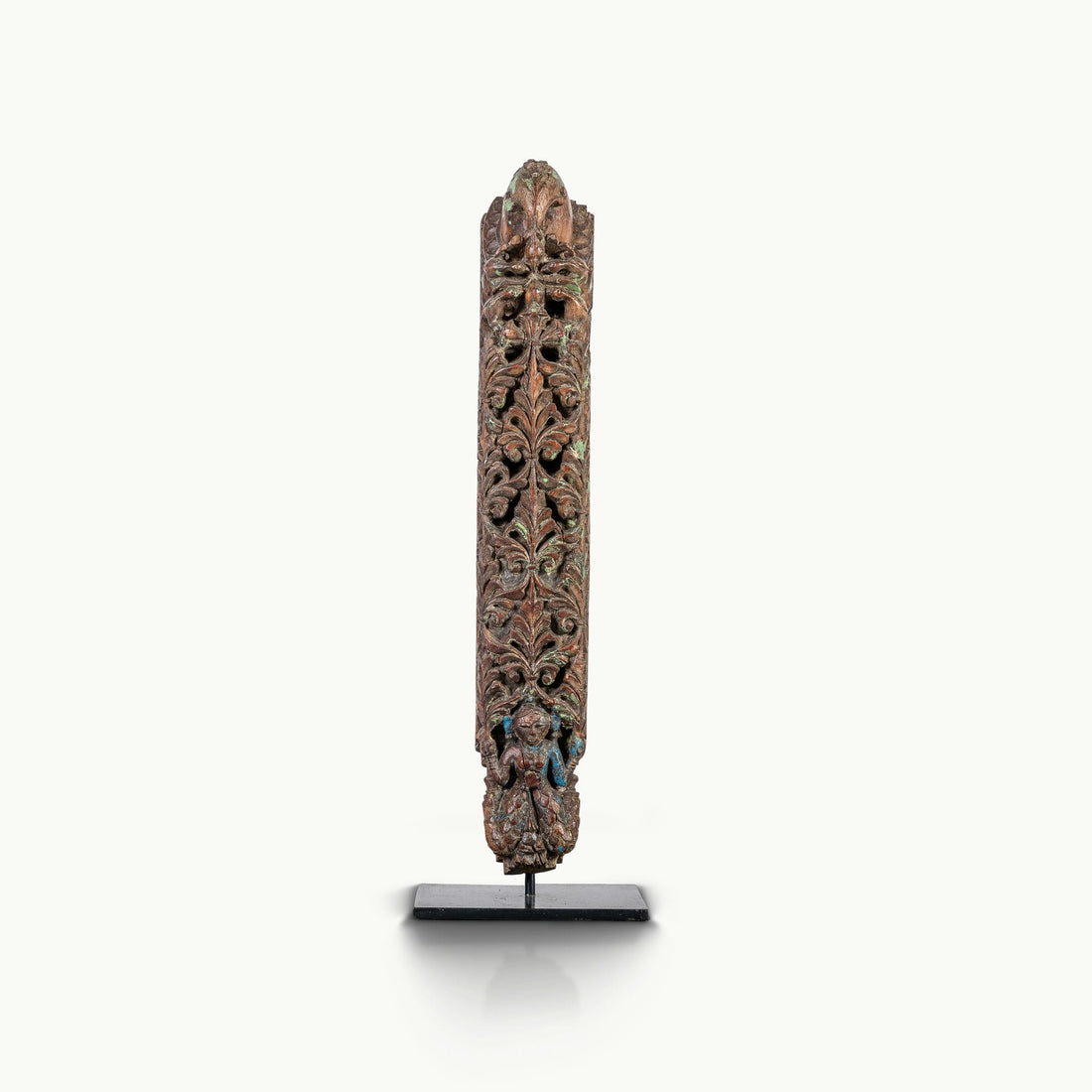 Antique wooden bracket with tinge of blue shade