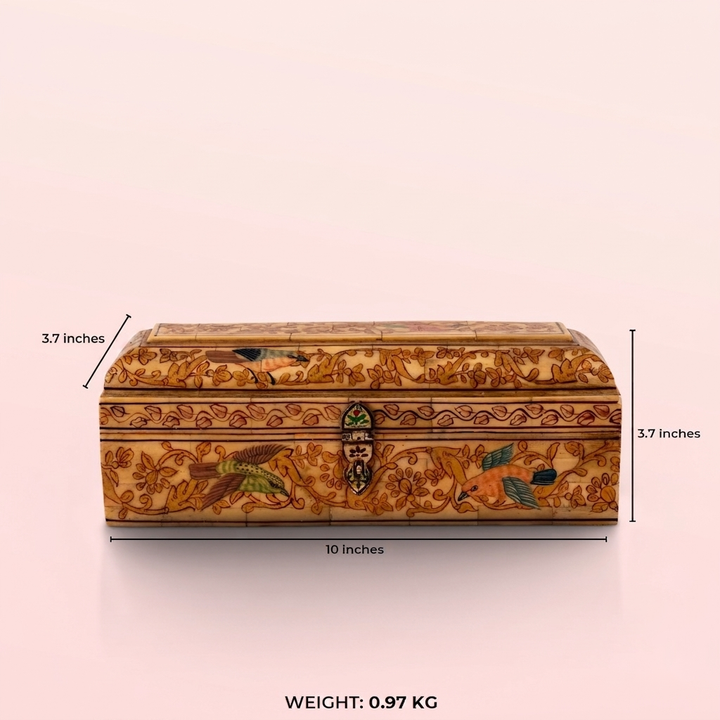 Hand-painted bone bird box with an antiqued ivory finish and intricate avian motifs.
