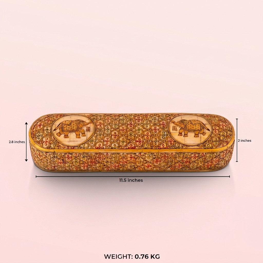 Elongated painted camel bone box featuring a sliding wooden tray and elephant medallions.
