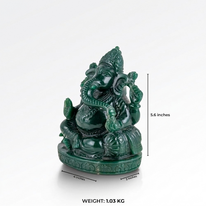 Jade stone Ganesha statue seated in Abhaya mudra with a highly polished emerald finish.