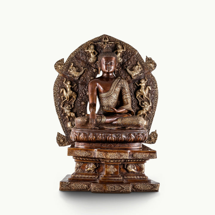 Monumental dual-tone brass Buddha statue with an intricate, highly detailed mandorla.