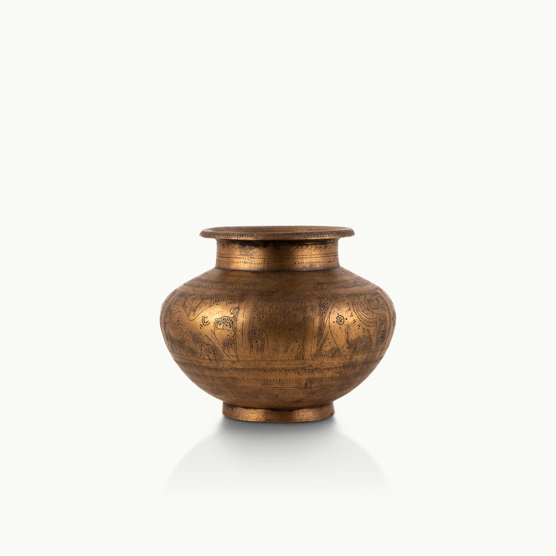 Engraved Brass Elephant Water Pot wrapped in a wildlife frieze for a walnut executive desk.