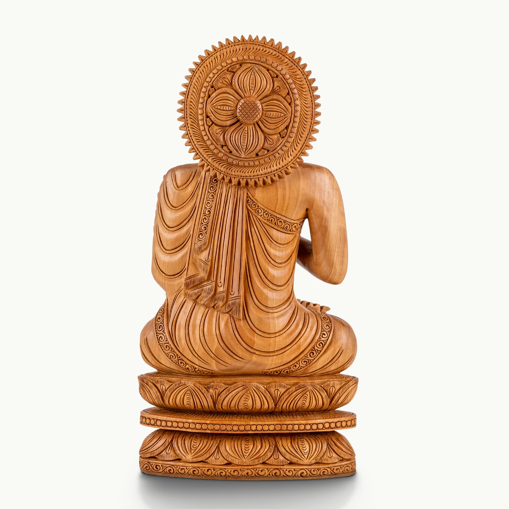 Rosewood buddha in sitting position