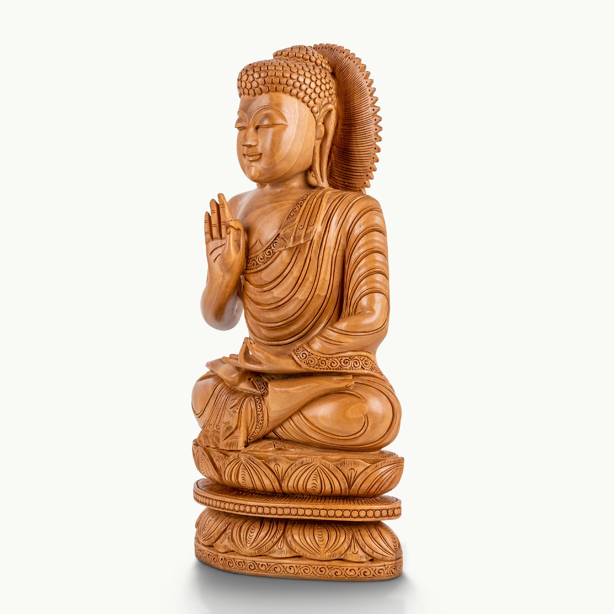 Rosewood buddha in sitting position