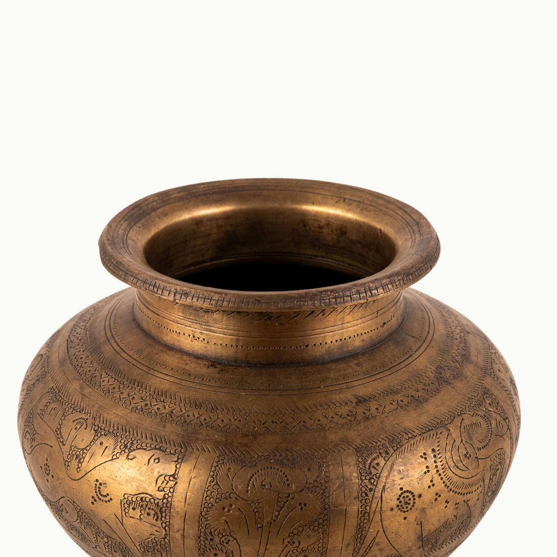 Engraved Brass Elephant Water Pot wrapped in a wildlife frieze for a walnut executive desk.