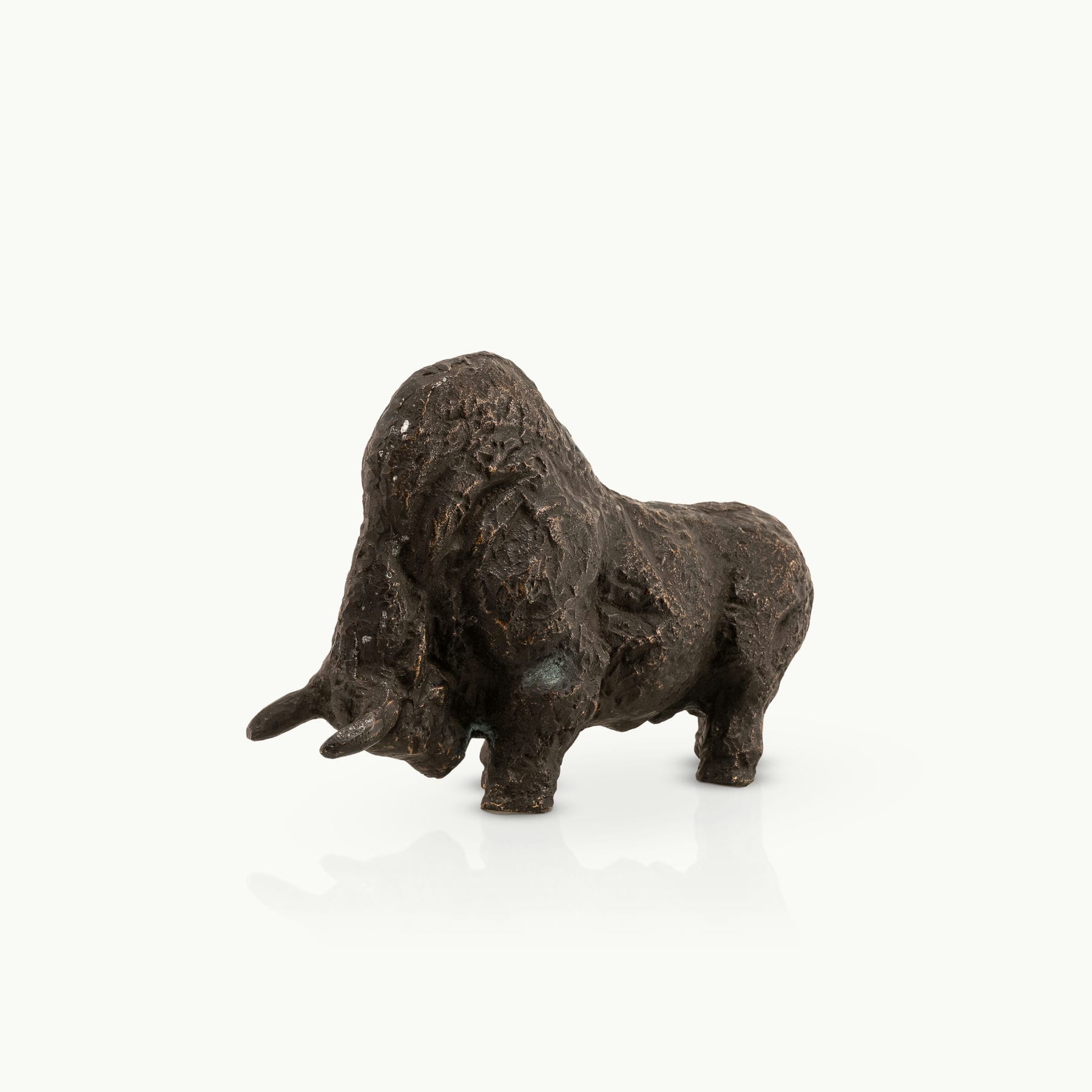 Abstract heavy metal animal figurine highlighting deep cratered surface patterns for a minimalist concrete 
