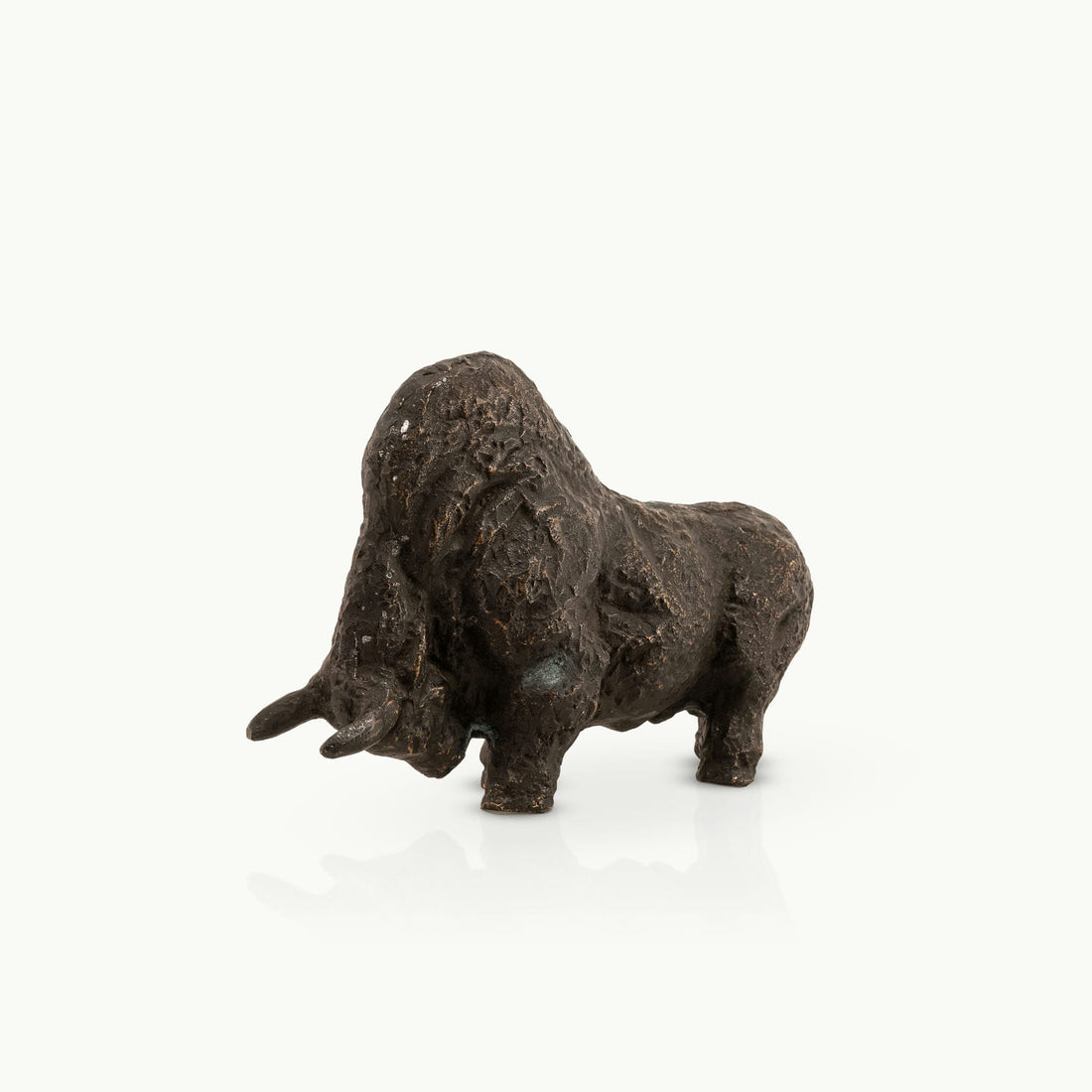 Abstract heavy metal animal figurine highlighting deep cratered surface patterns for a minimalist concrete 