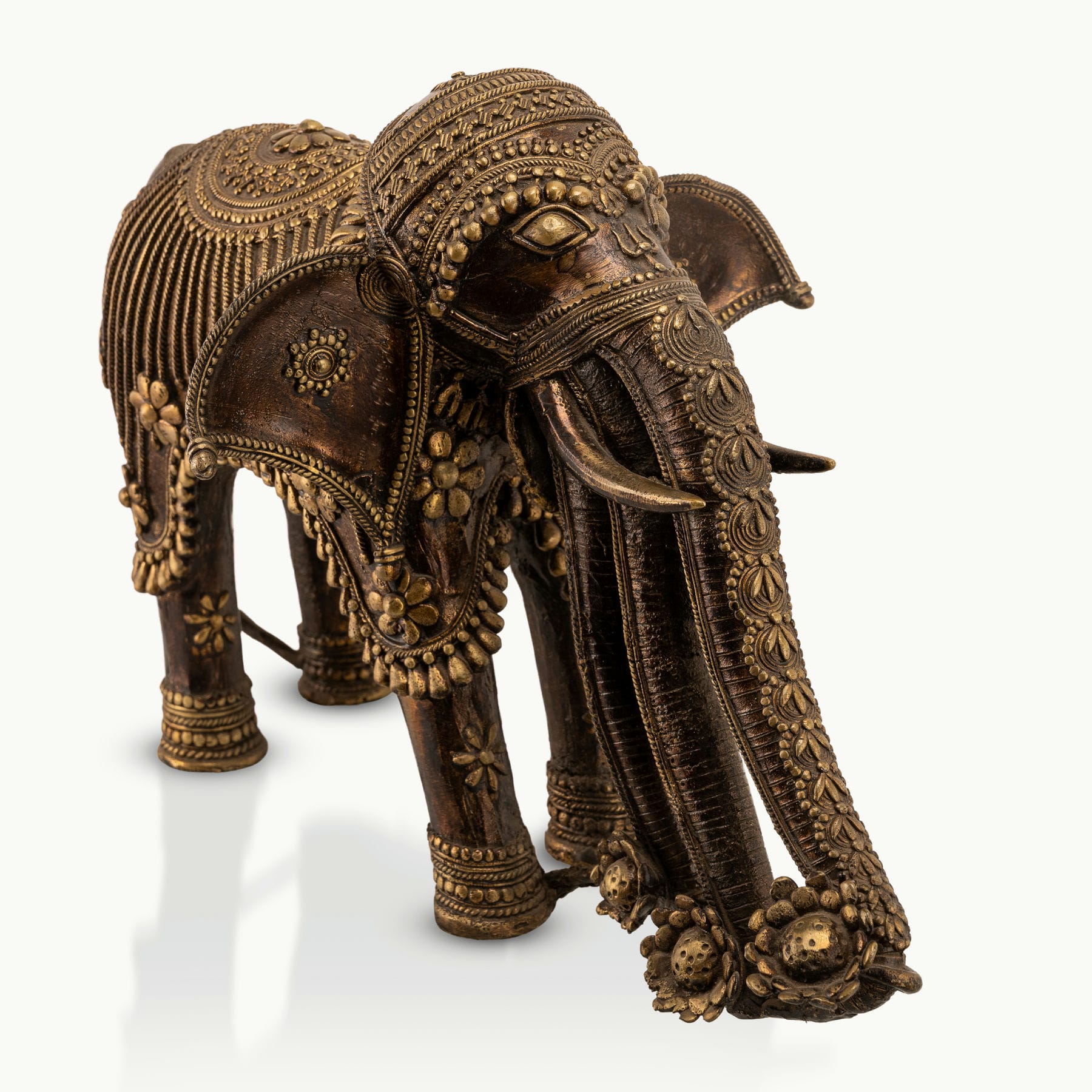 Monumental Brass Elephant Sculpture showing grounded authority on a reinforced architectural console. 