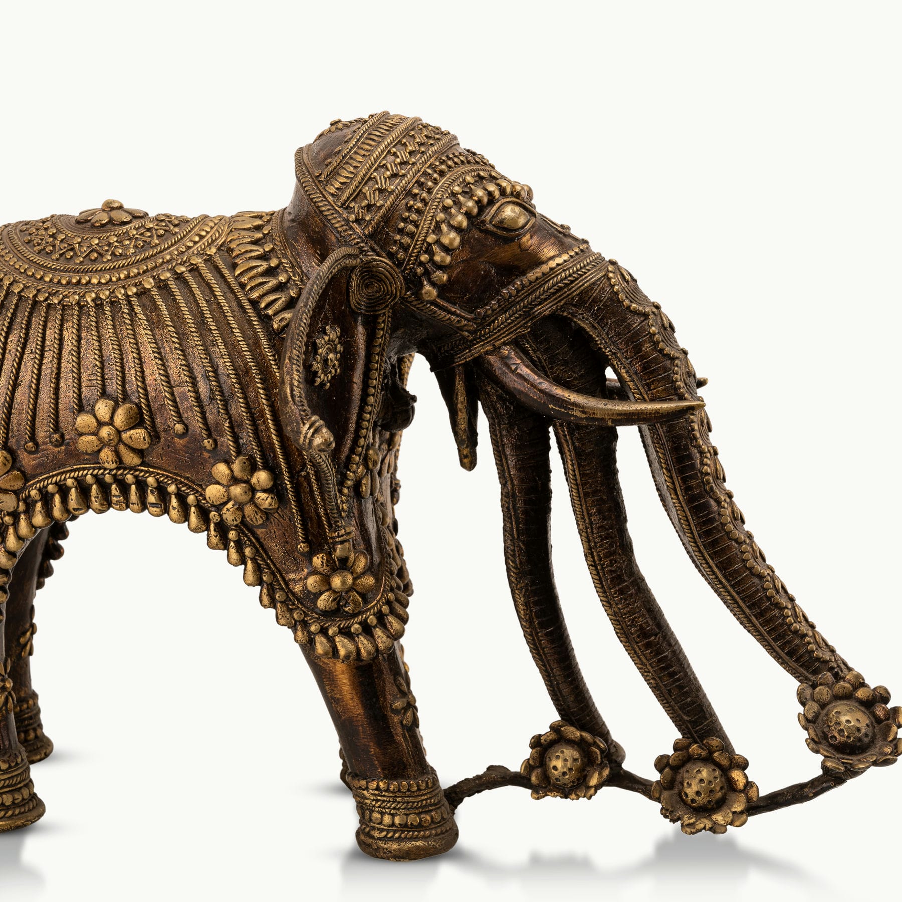 Monumental Brass Elephant Sculpture showing grounded authority on a reinforced architectural console. 