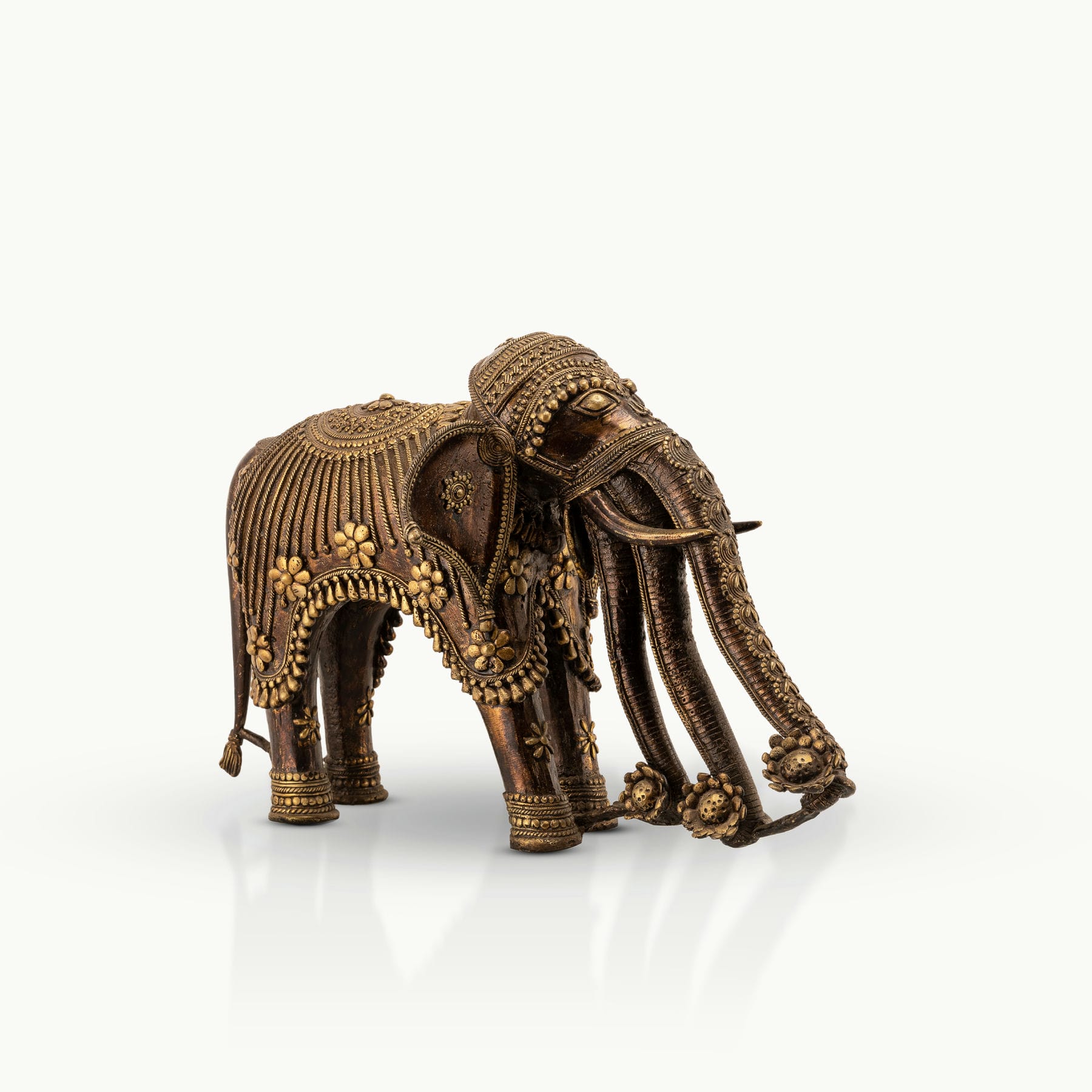 Monumental Brass Elephant Sculpture showing grounded authority on a reinforced architectural console. 