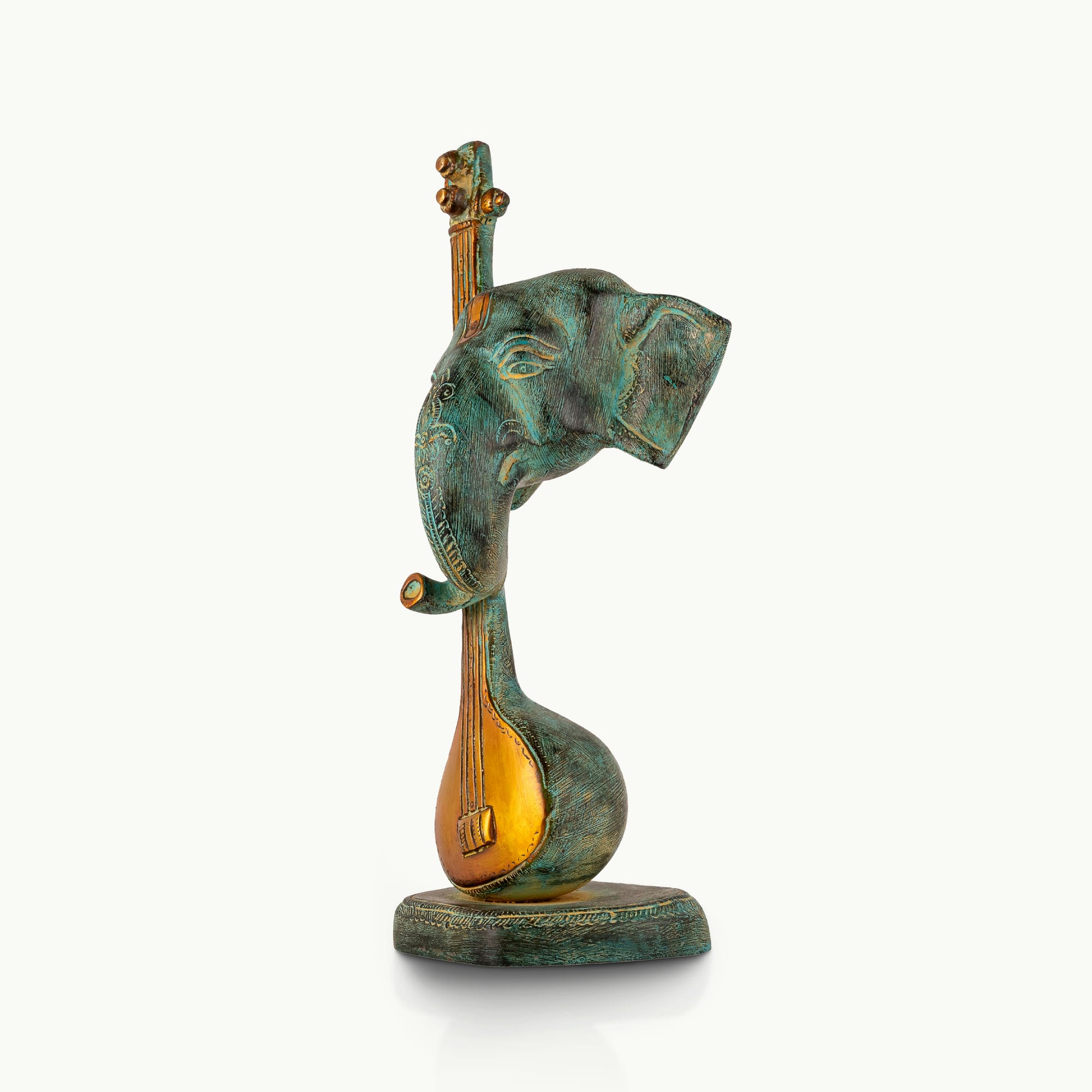 Verdigris Musical Elephant Sculpture on a classical stringed instrument for a console.