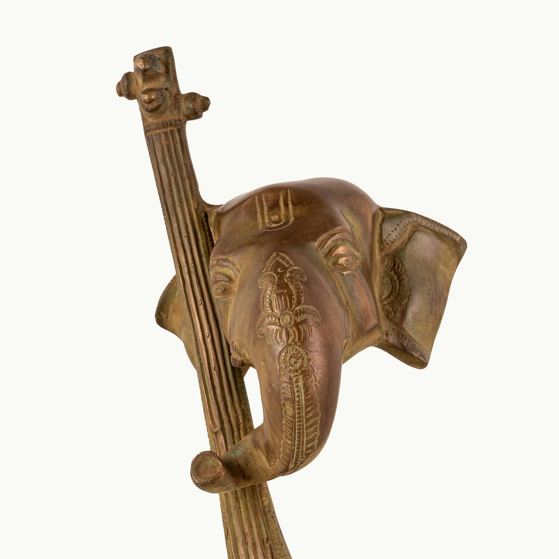 Antique Brass Musical Elephant merging with a veena for a dark walnut desk.