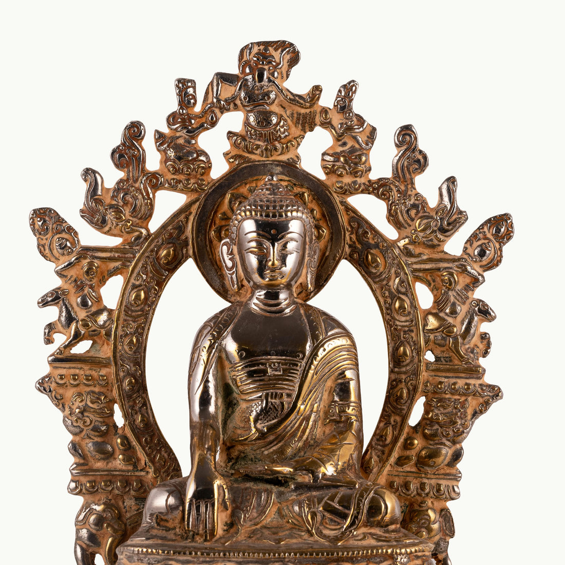 Handcrafted metal enlightened ascetic idol with an antiqued aureole for a meditation room centerpiece or spiritual housewarming gift.