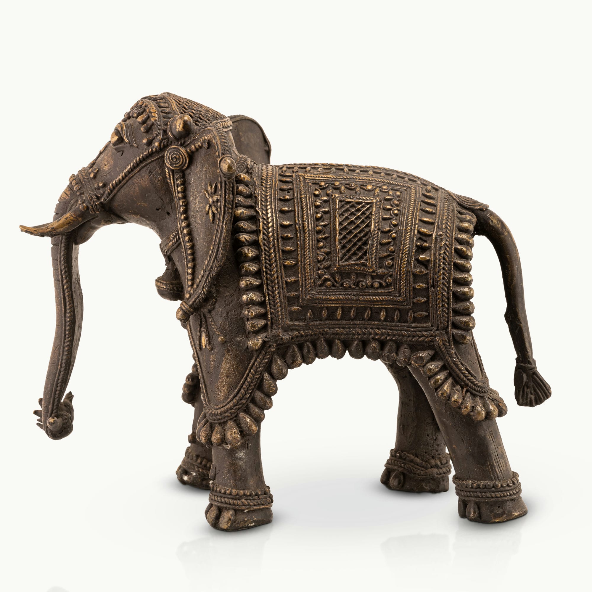 Indian ceremonial guardian decor showcasing intricate beadwork and dark patina for a solid mahogany desk or heritage office decor.