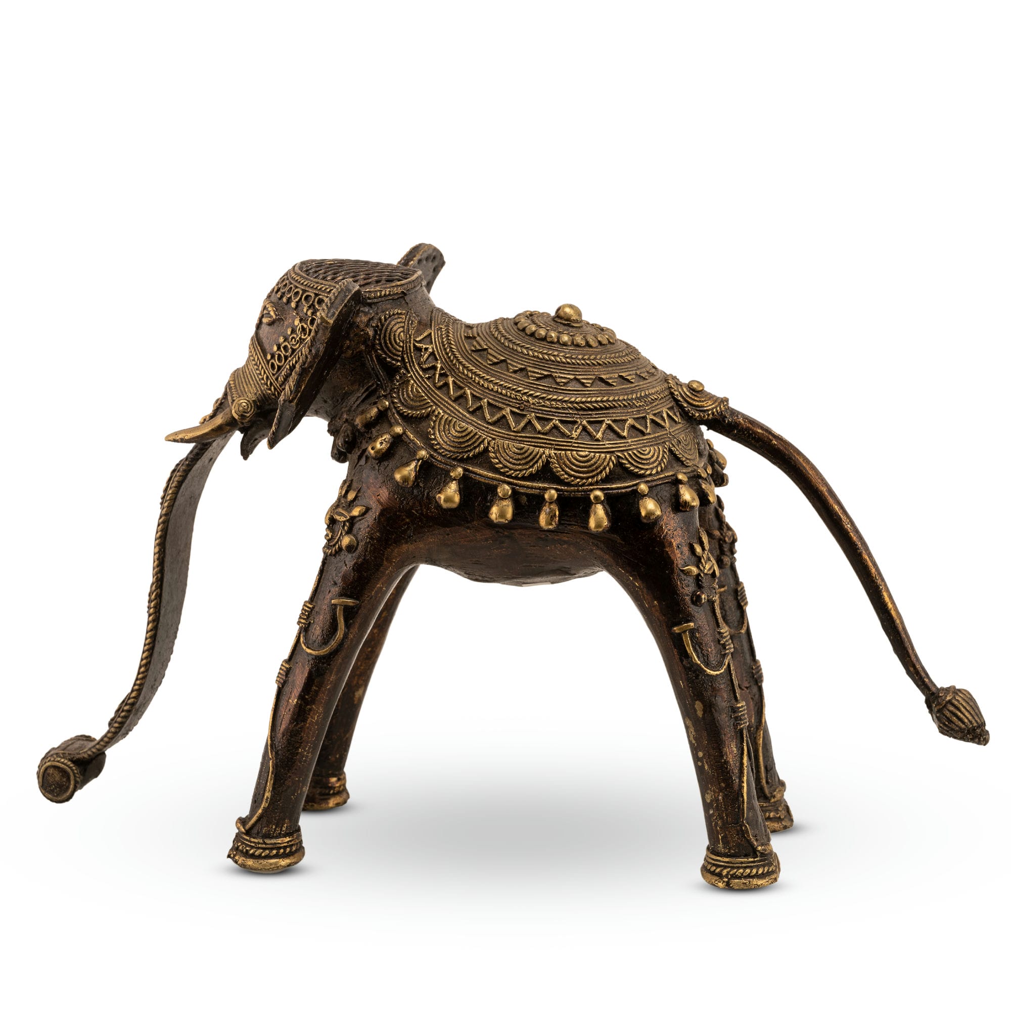Indian metal ceremonial beast decor featuring a stylized elongated trunk for a wide wooden bookshelf or traditional home decor.