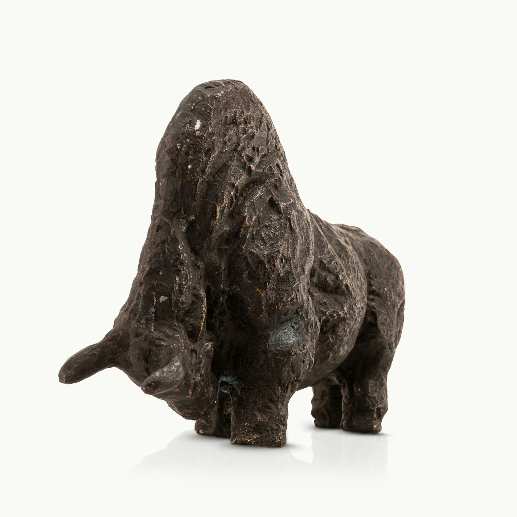 Abstract heavy metal animal figurine highlighting deep cratered surface patterns for a minimalist concrete 