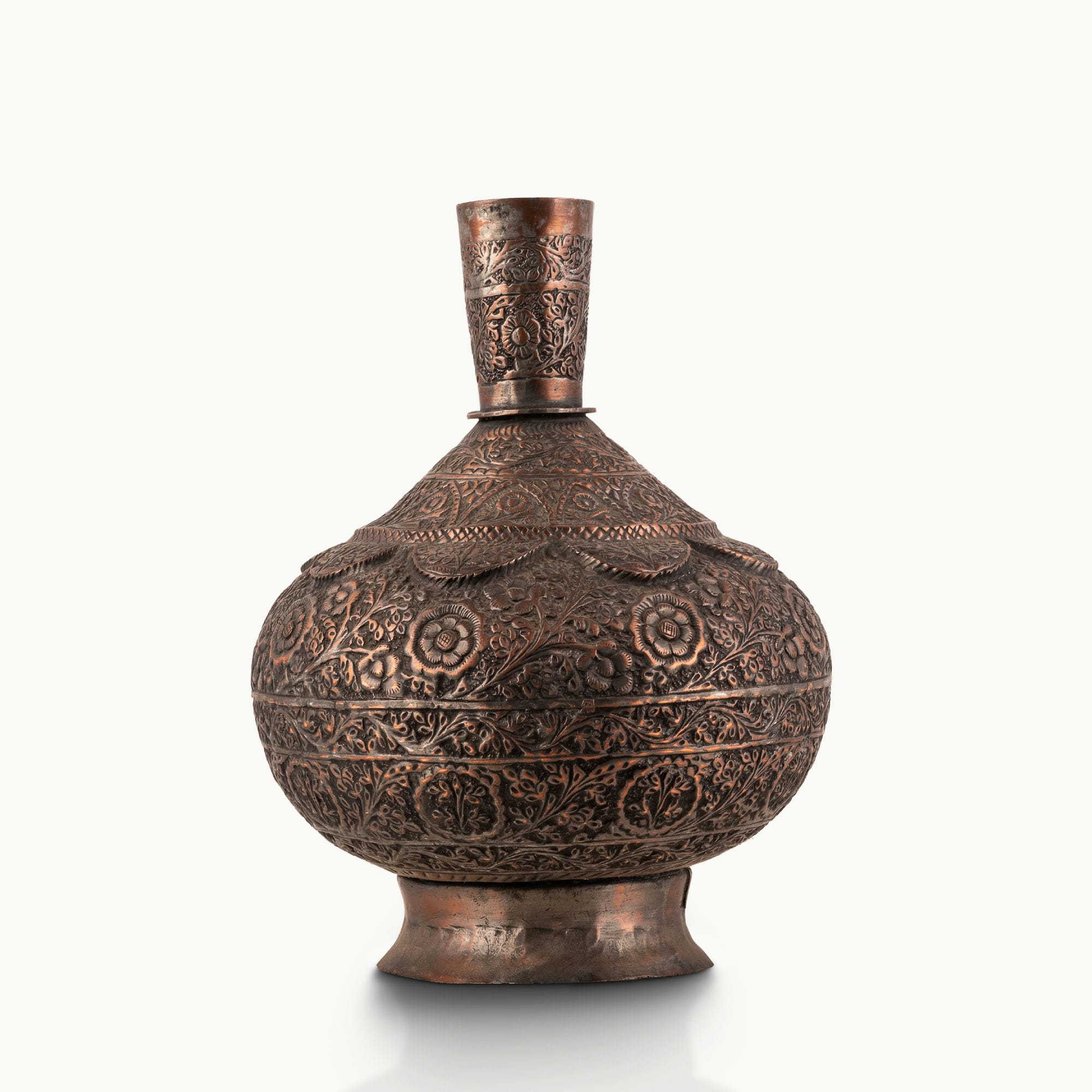 Engraved Copper Surahi Vase decorated for a floating black console.