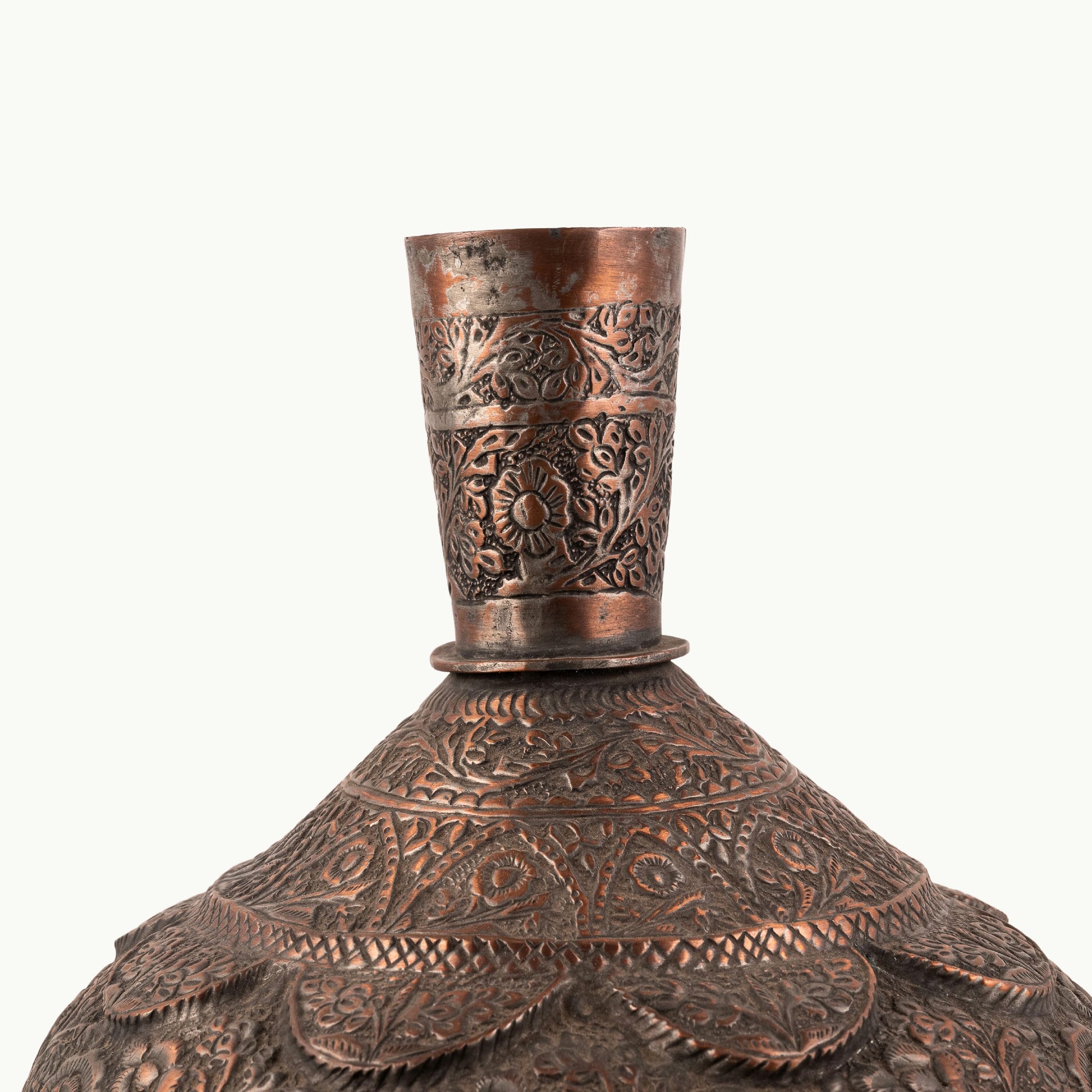 Engraved Copper Surahi Vase decorated for a floating black console.