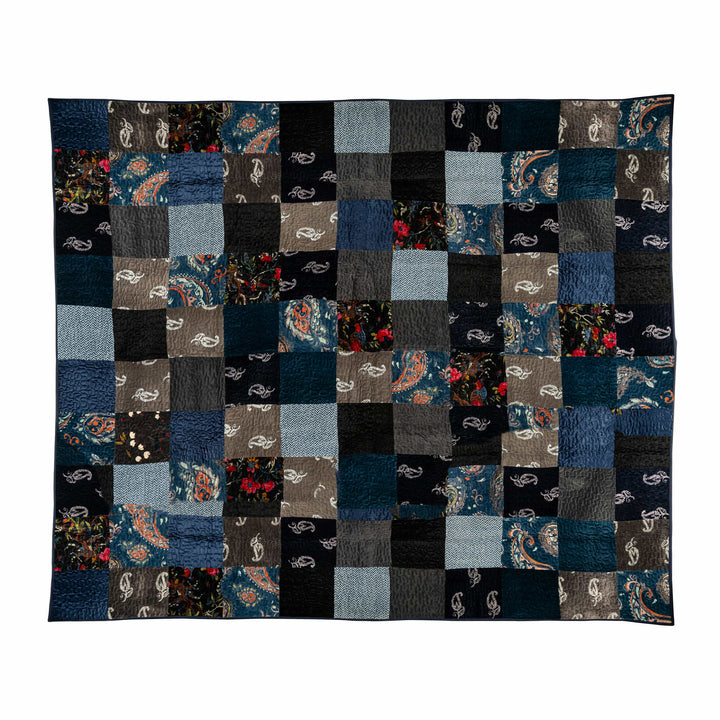 Floral patchwork velvet bedcover featuring a jewel-toned mosaic of stitched squares, paisleys, and vermicelli quilting.