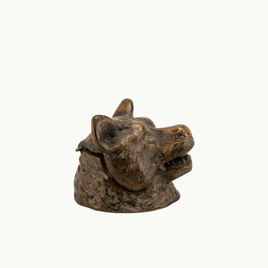 Antiqued Brass Bear Inkwell functioning as a rugged desk accessory on a study desk. 