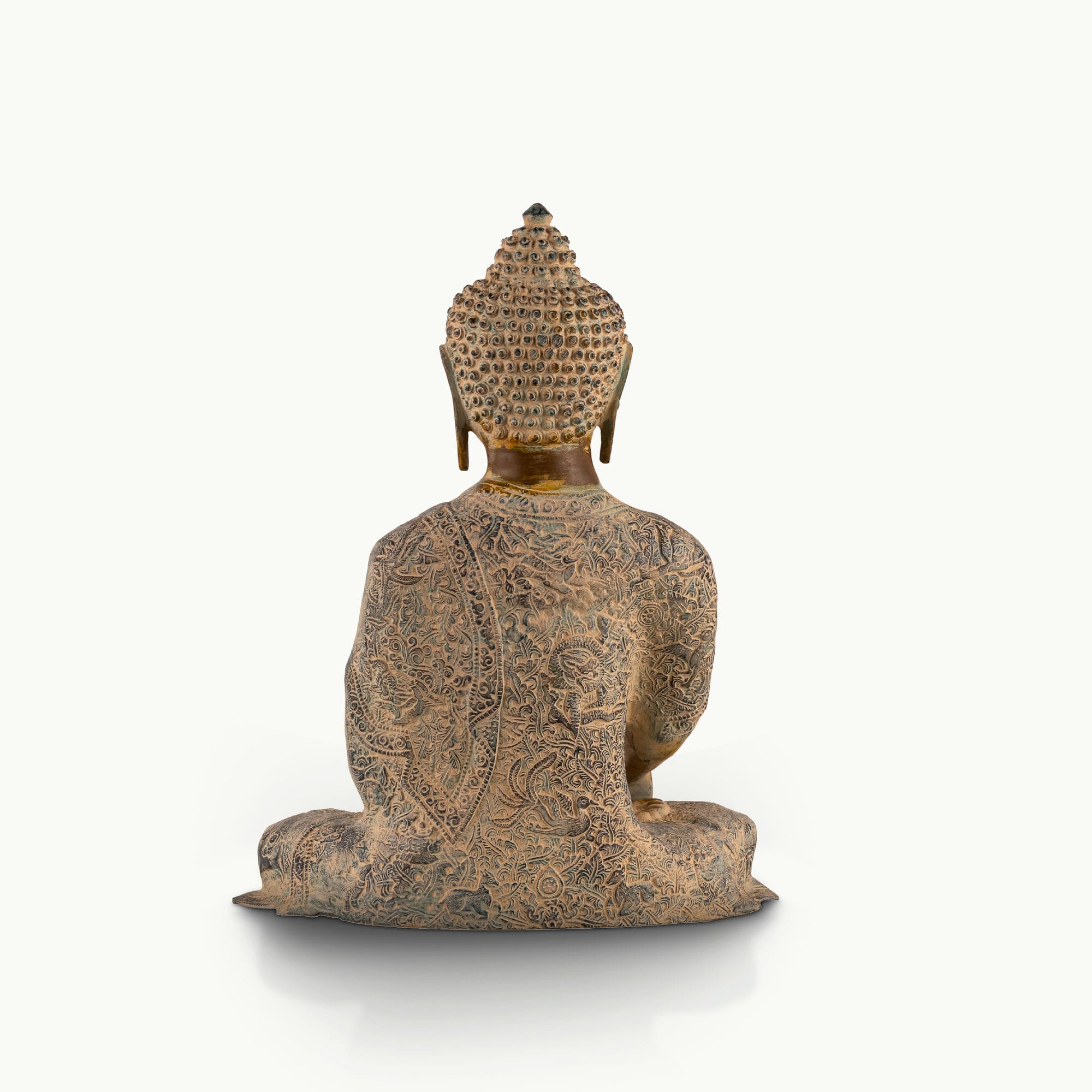 Patterned Brass Bhumisparsha Buddha Statue touching the earth for a sunlit atrium. 
