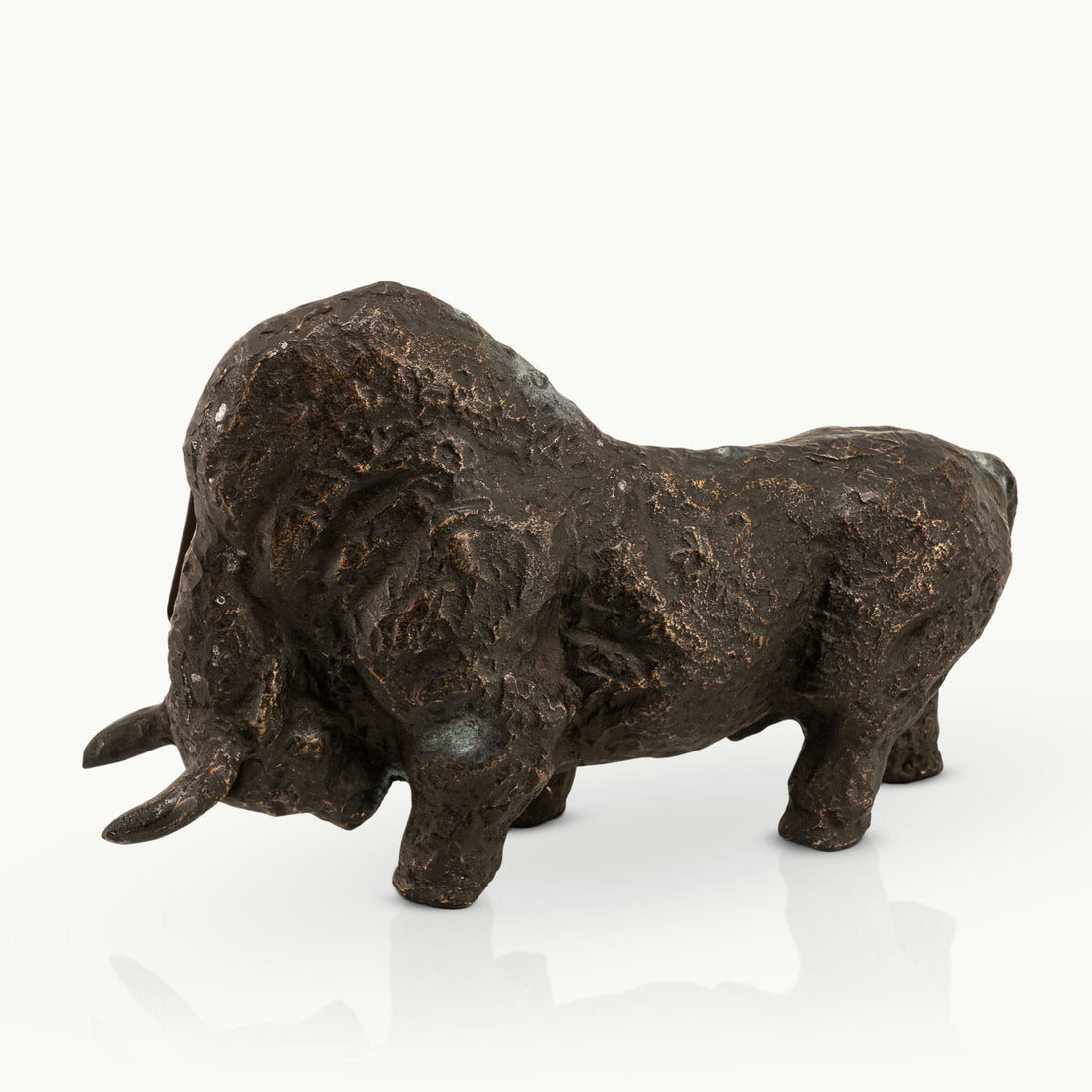 Abstract heavy metal animal figurine highlighting deep cratered surface patterns for a minimalist concrete 