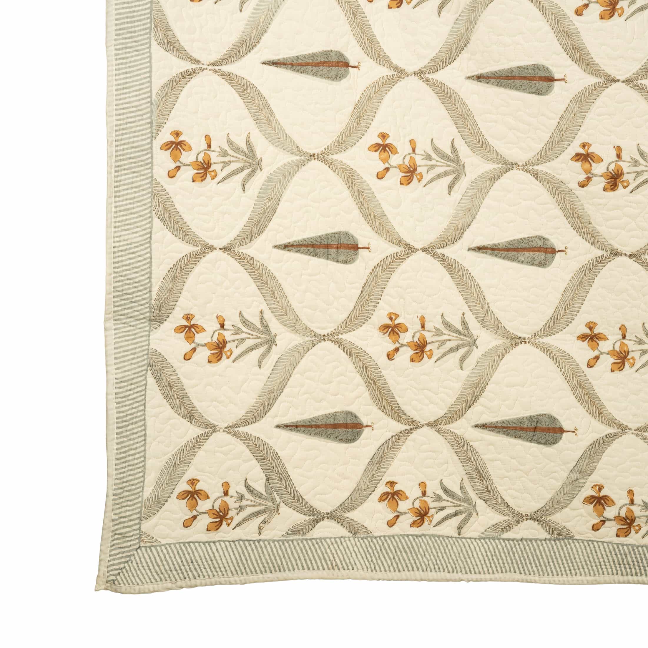 Hand-stitched cotton quilted coverlet with feather and blossom ogee pattern