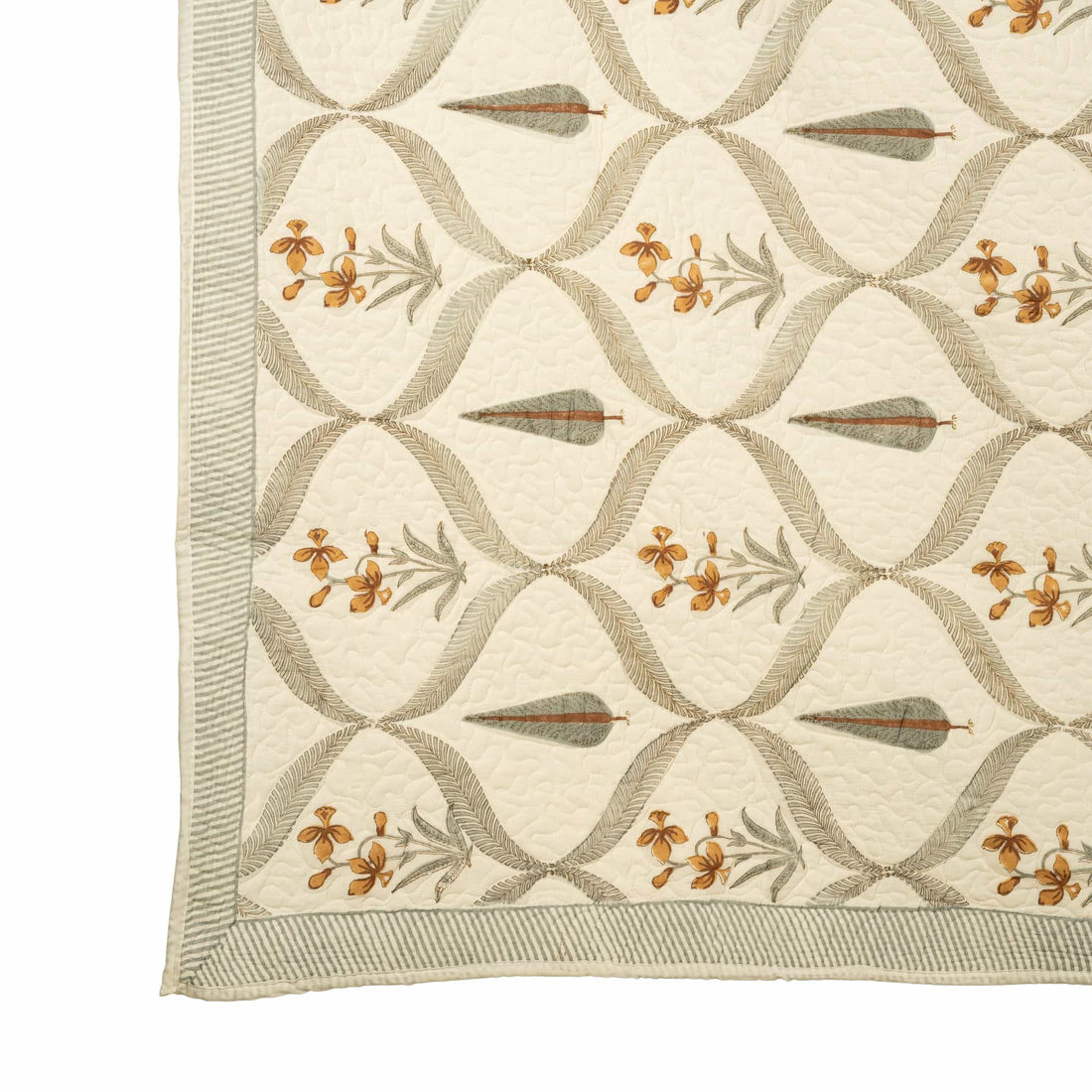 Hand-stitched cotton quilted coverlet with feather and blossom ogee pattern