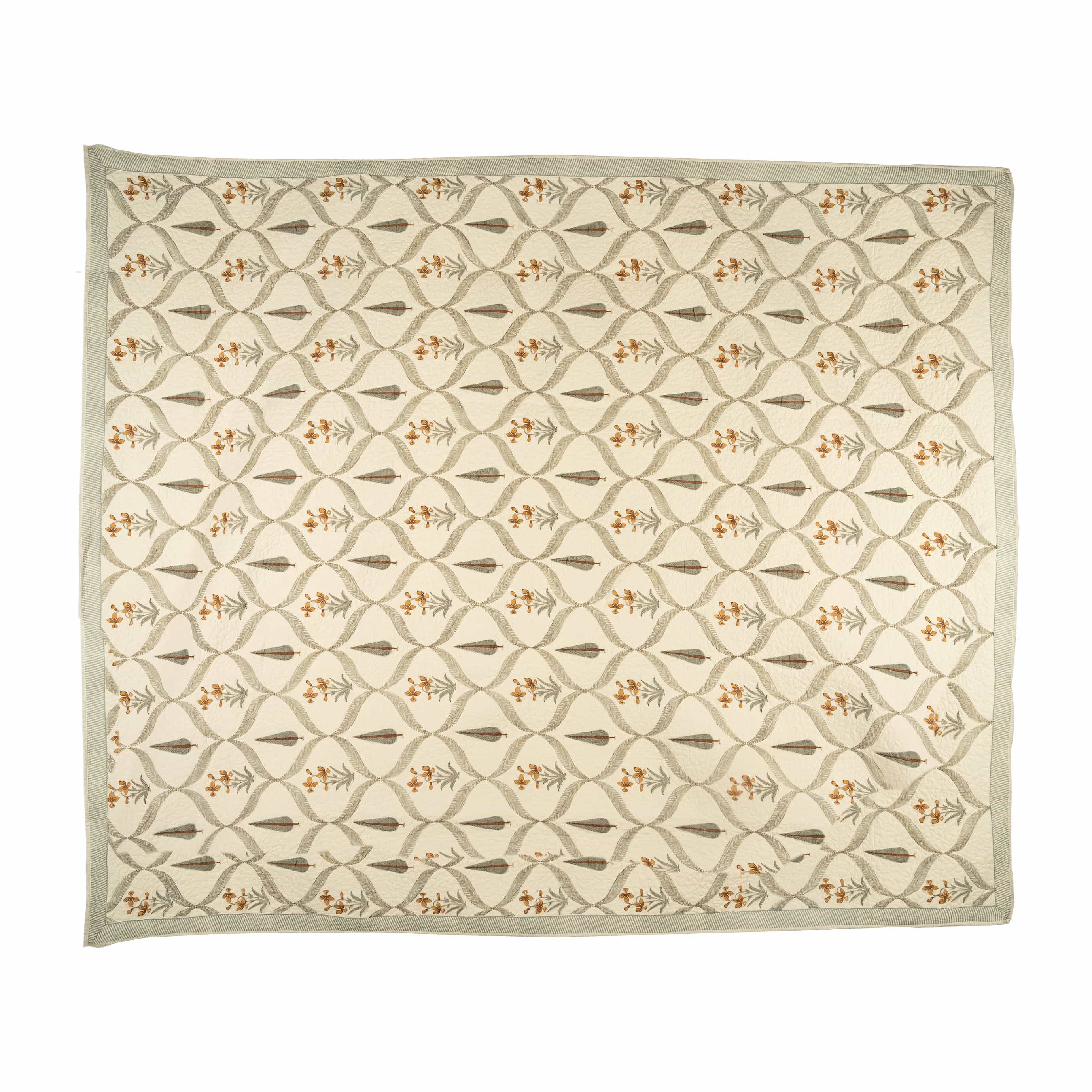 Hand-stitched cotton quilted coverlet with feather and blossom ogee pattern
