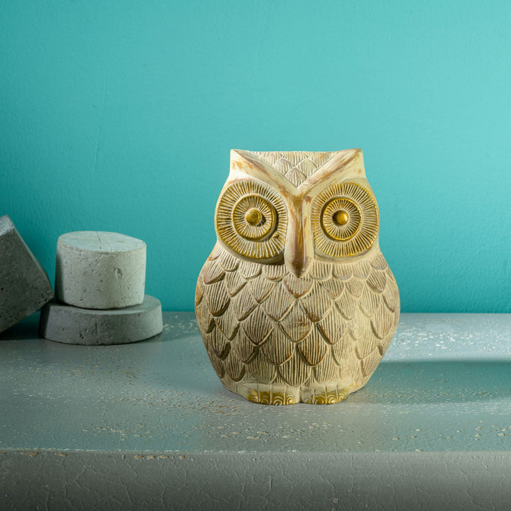 Whitewashed textured owl figurine with gilded eyes and accents