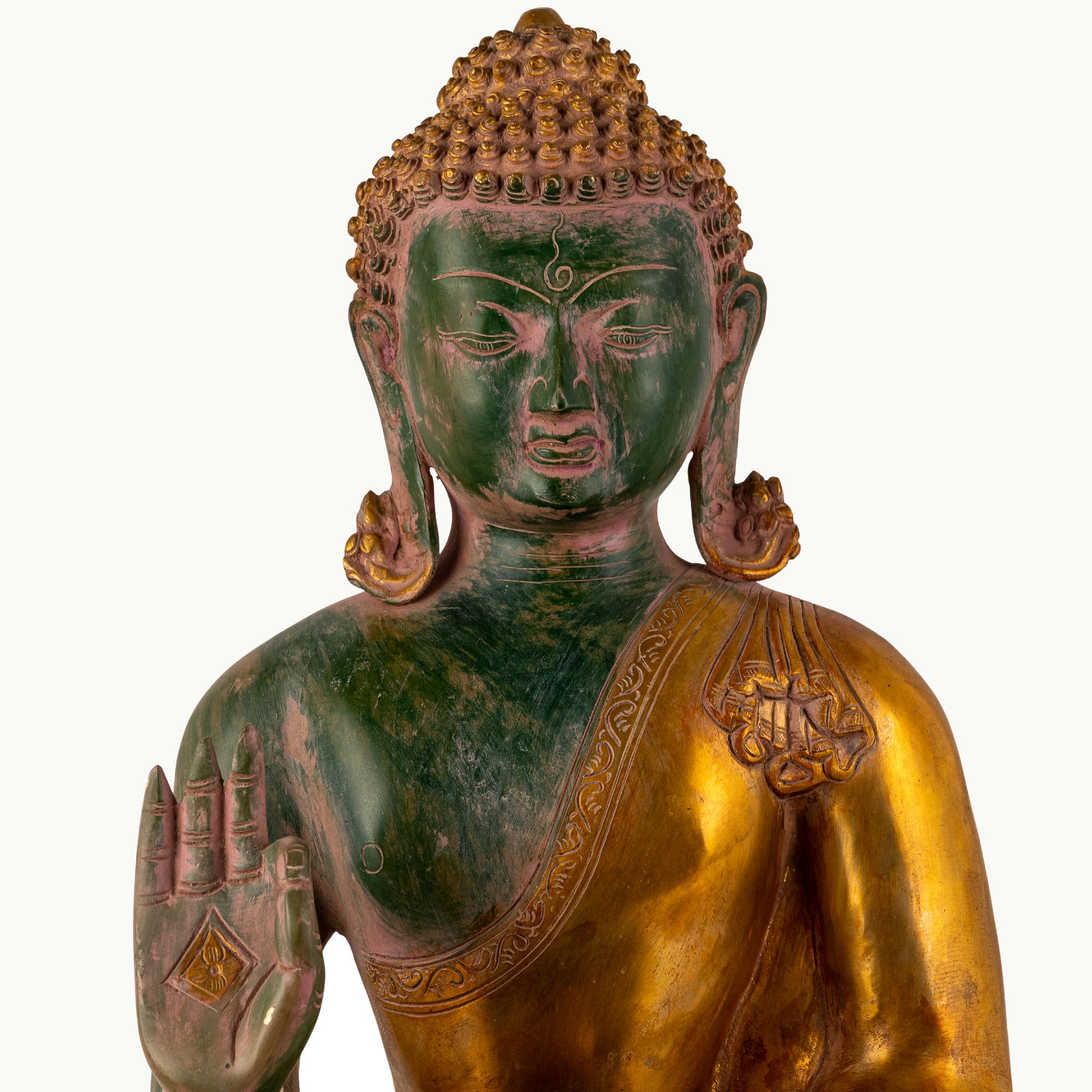 Green Dual-Tone Brass Buddha displaying the Abhaya mudra for an expansive living room.