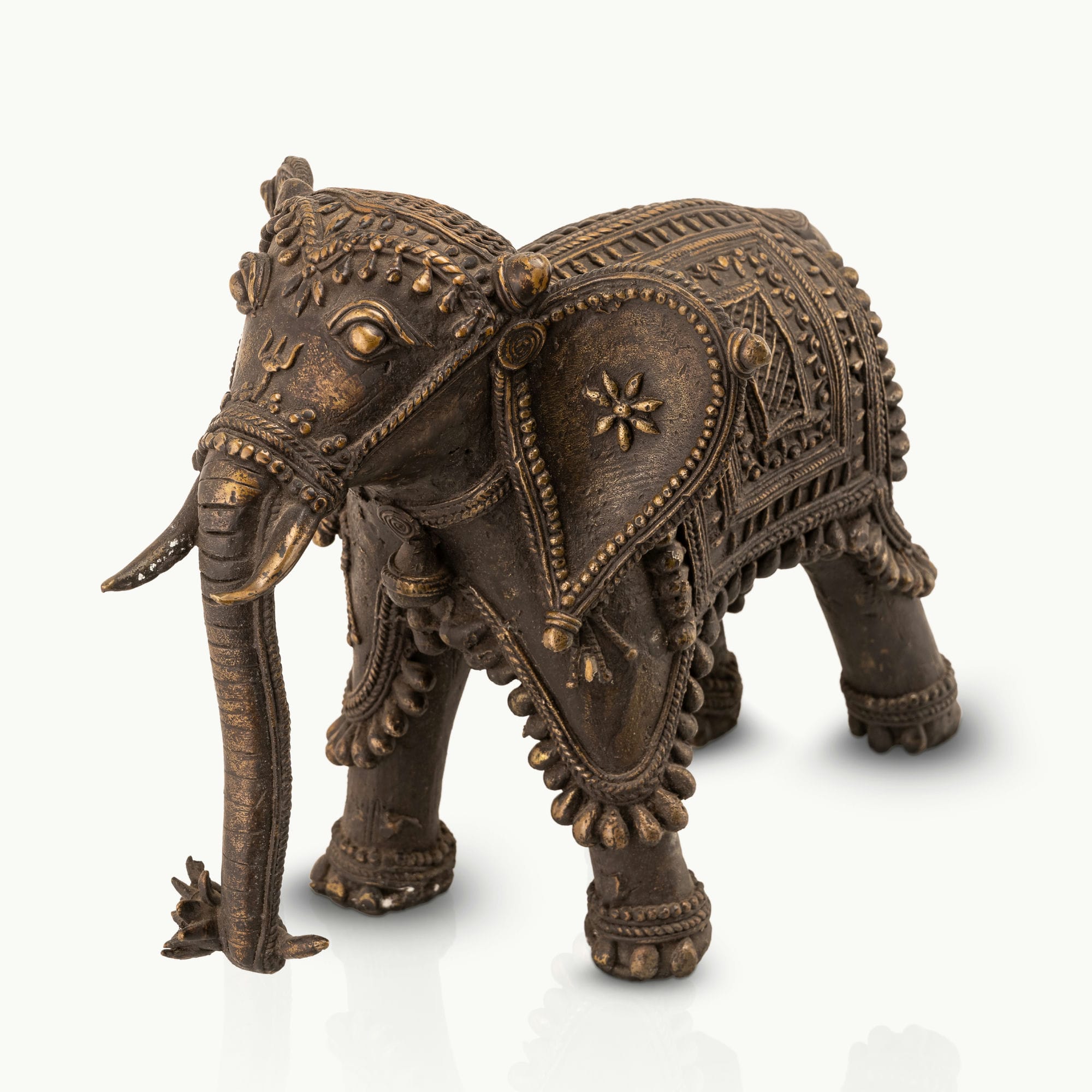 Indian ceremonial guardian decor showcasing intricate beadwork and dark patina for a solid mahogany desk or heritage office decor.