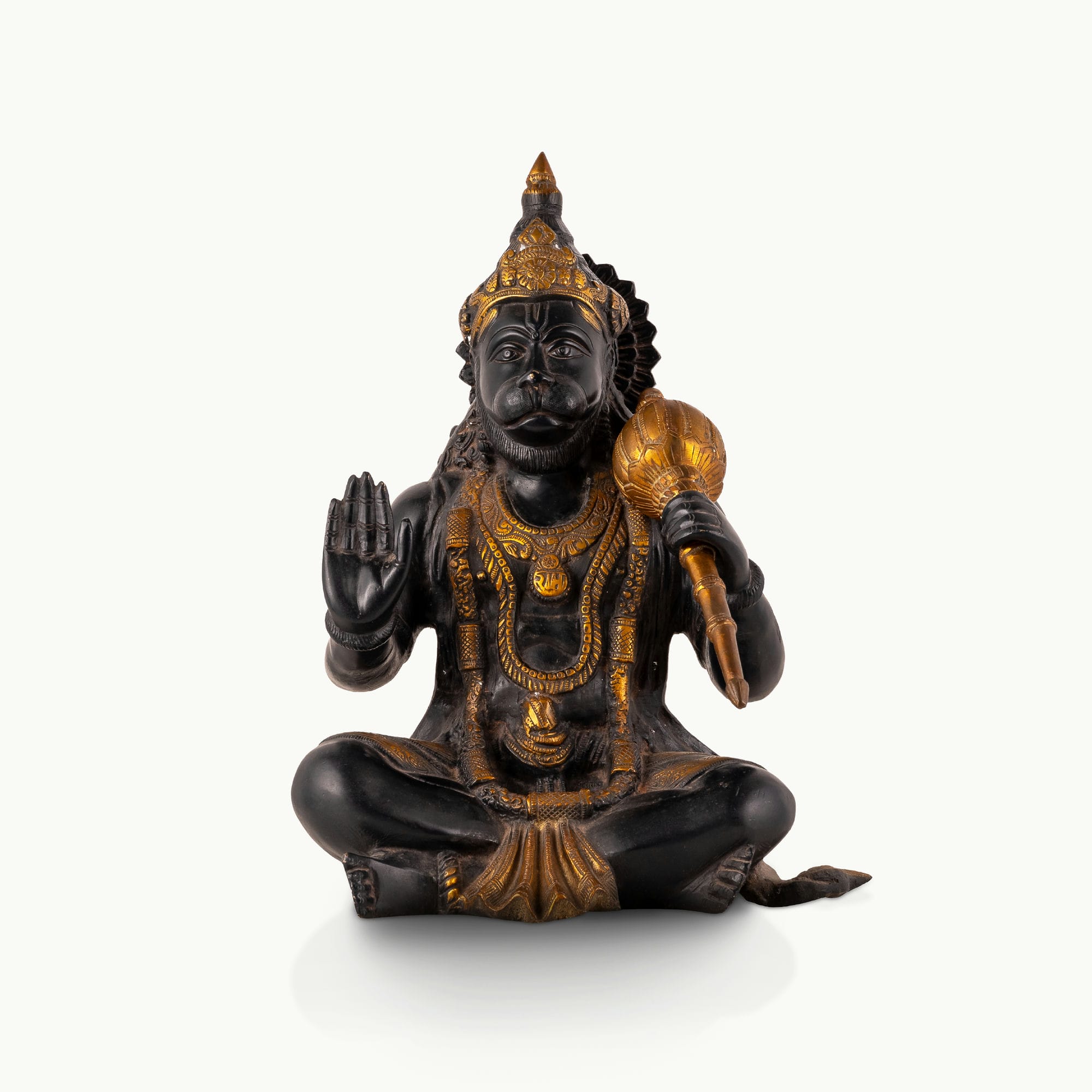 Dark Oxidized Brass Hanuman Statue holding a golden mace for an east-facing puja altar.