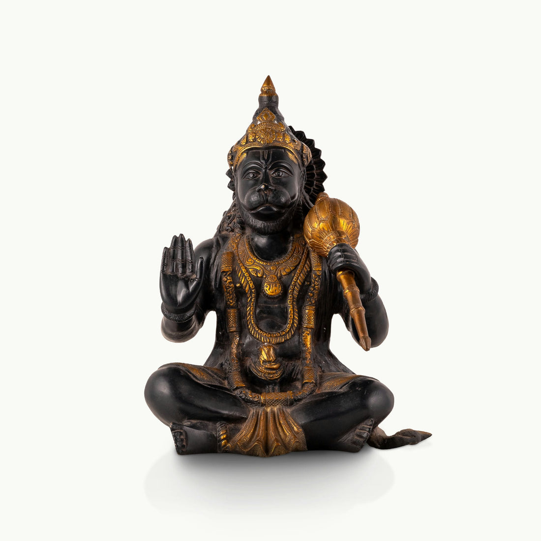 Dark Oxidized Brass Hanuman Statue holding a golden mace for an east-facing puja altar.