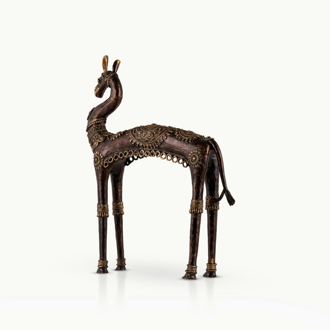Dhokra Brass Horse Sculpture featuring an elongated arch on a minimalist wooden credenza. 