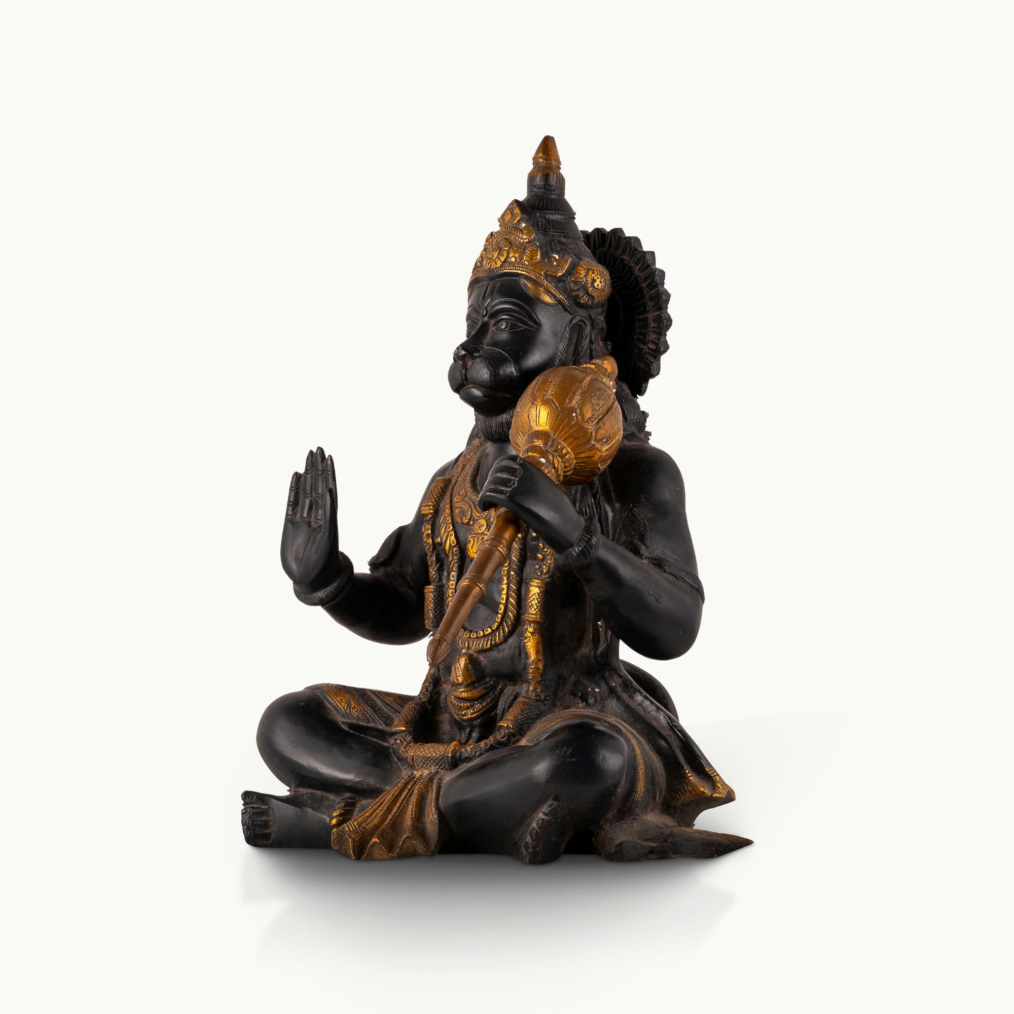 Dark Oxidized Brass Hanuman Statue holding a golden mace for an east-facing puja altar.