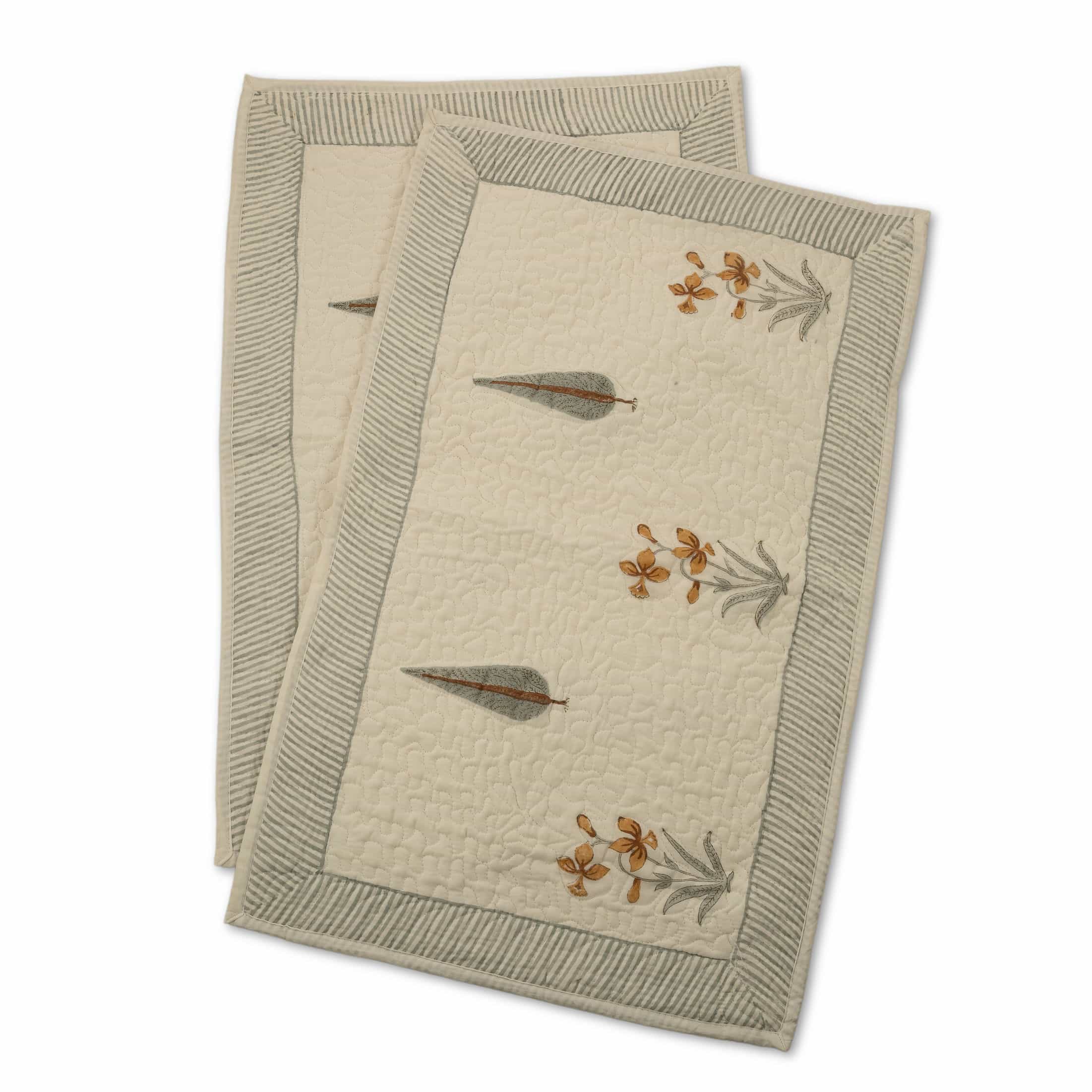 Hand-stitched cotton quilted coverlet with feather and blossom ogee pattern