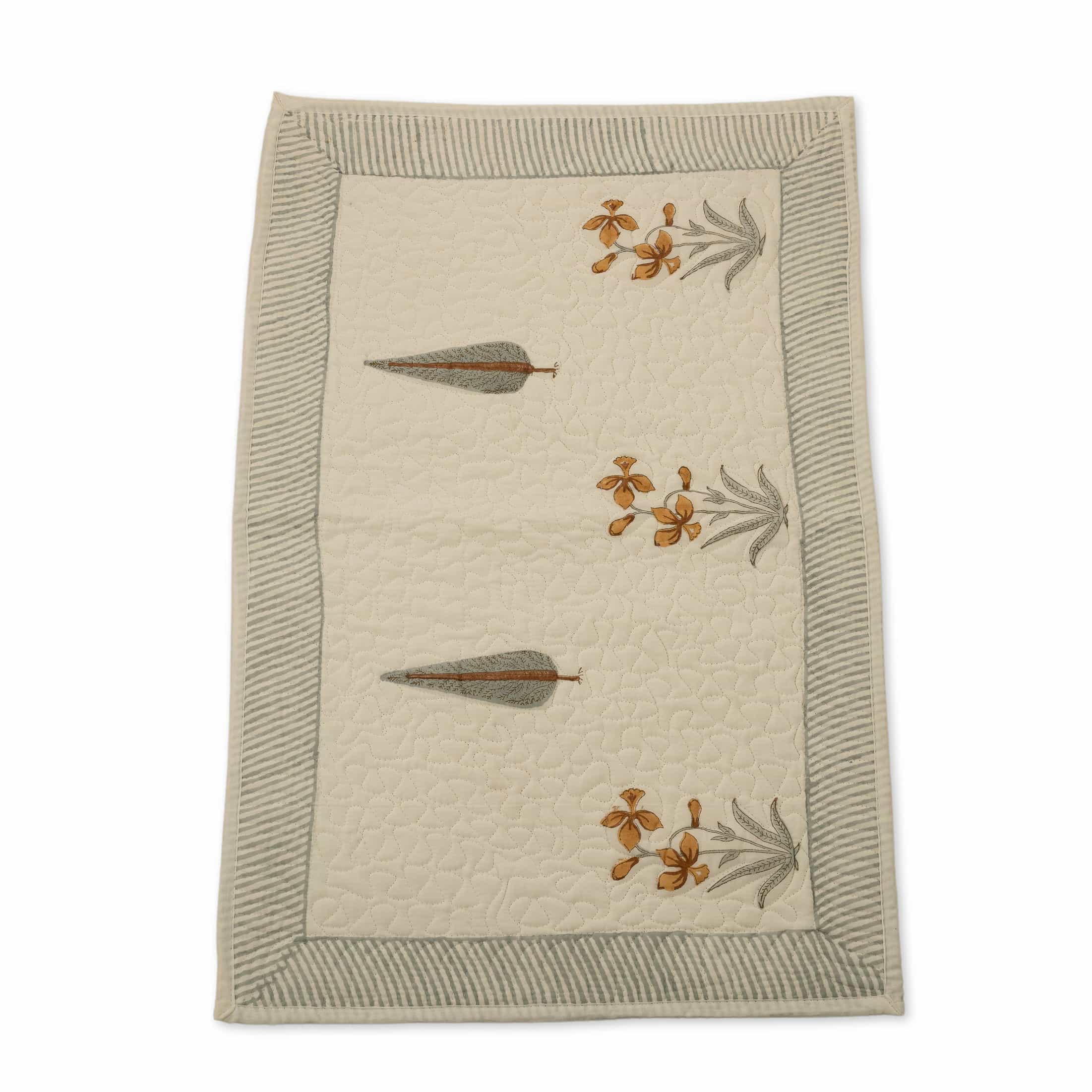 Hand-stitched cotton quilted coverlet with feather and blossom ogee pattern