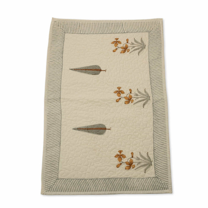 Hand-stitched cotton quilted coverlet with feather and blossom ogee pattern