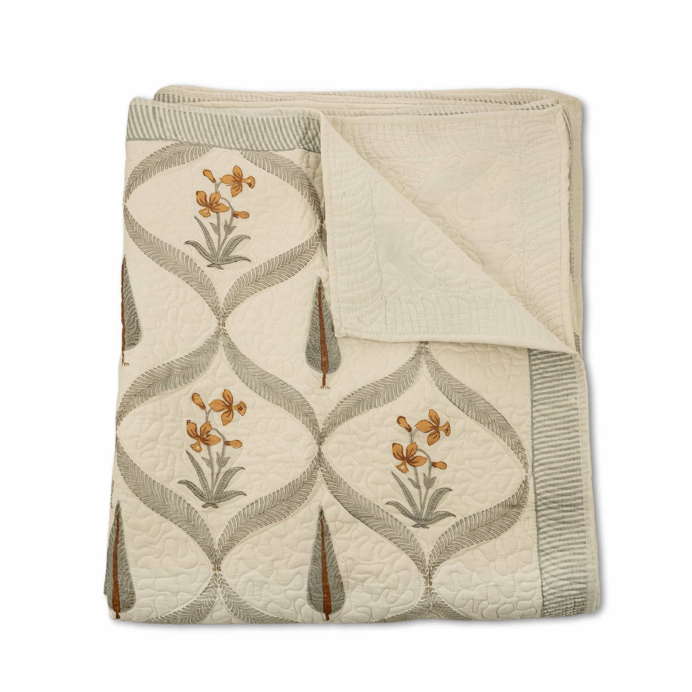 Hand-stitched cotton quilted coverlet with feather and blossom ogee pattern