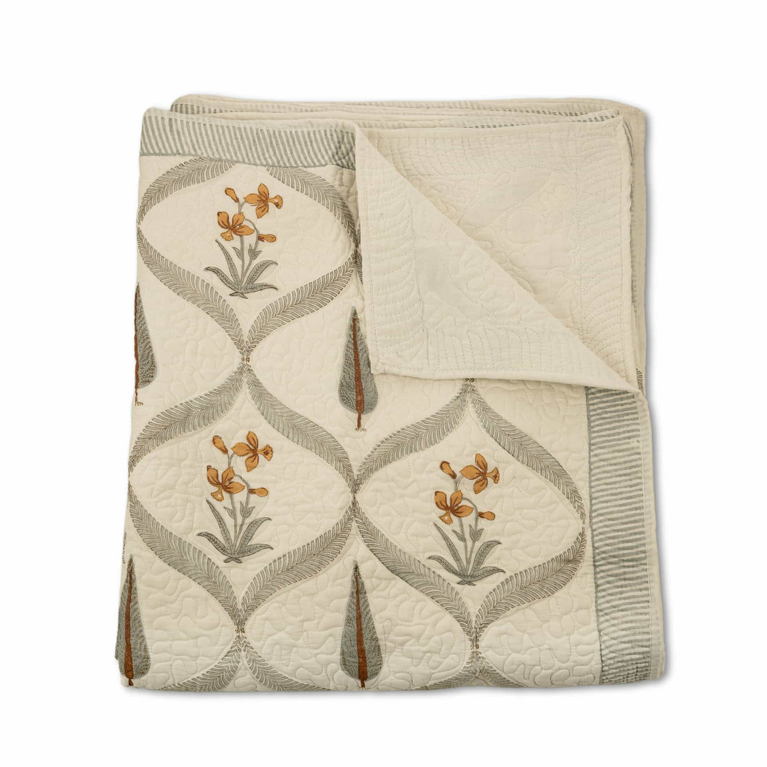 Hand-stitched cotton quilted coverlet with feather and blossom ogee pattern