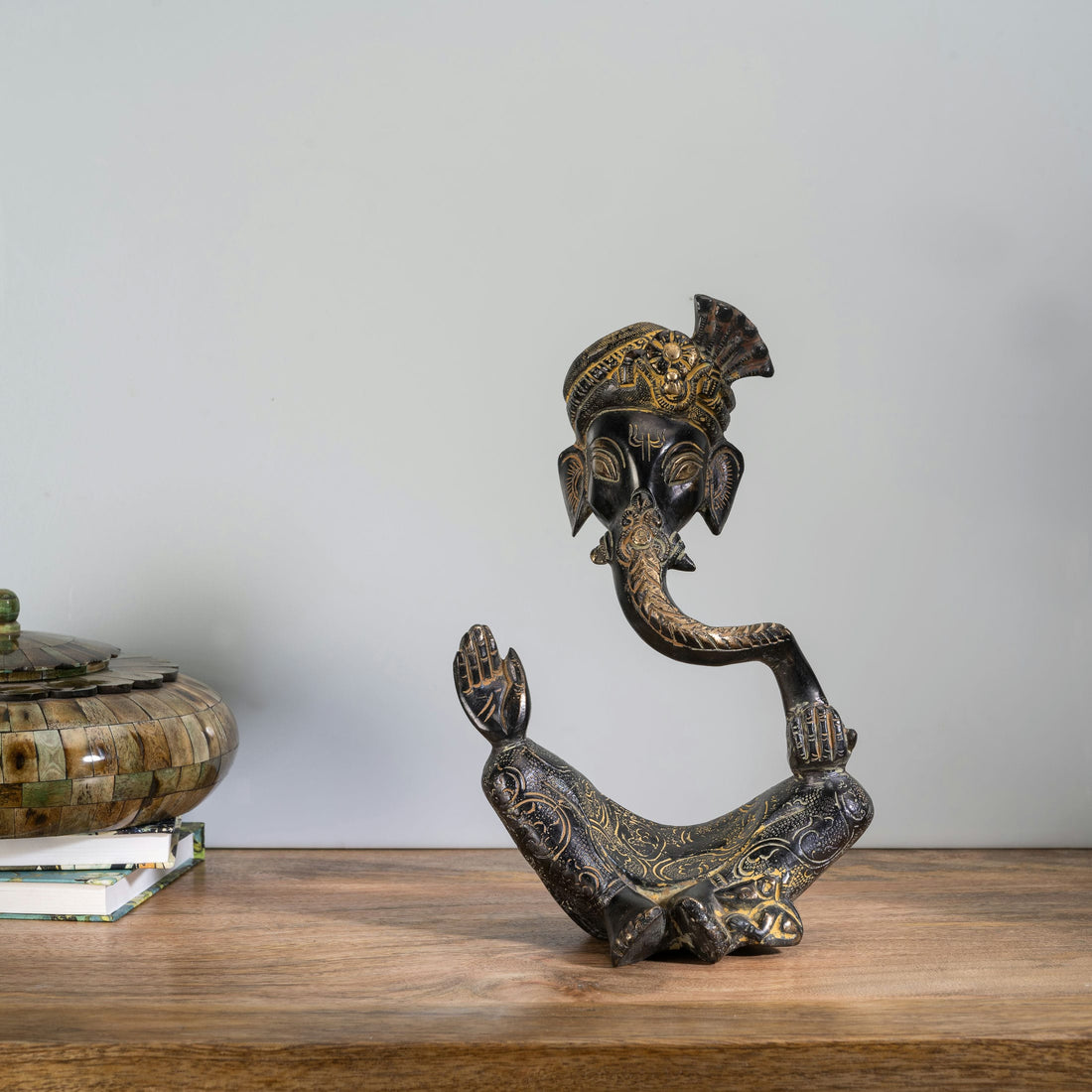 Stylized Black Brass Ganesha Sculpture: The Sweeping Sovereign