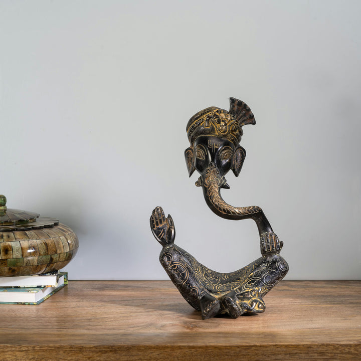 Stylized Black Brass Ganesha Sculpture: The Sweeping Sovereign