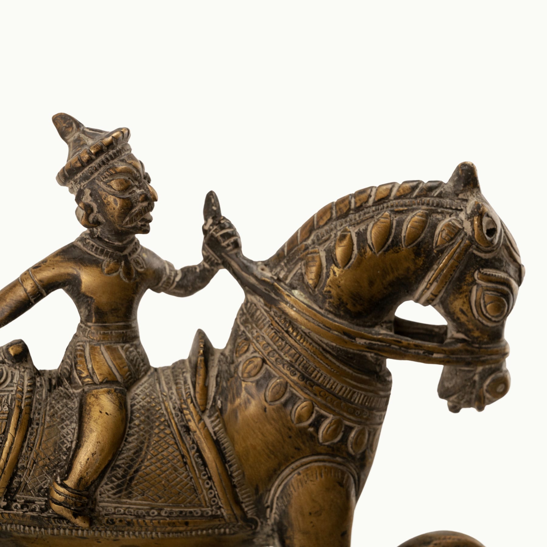 Antique Brass Horse Nutcracker showing mechanical grandeur on a living room coffee table. 