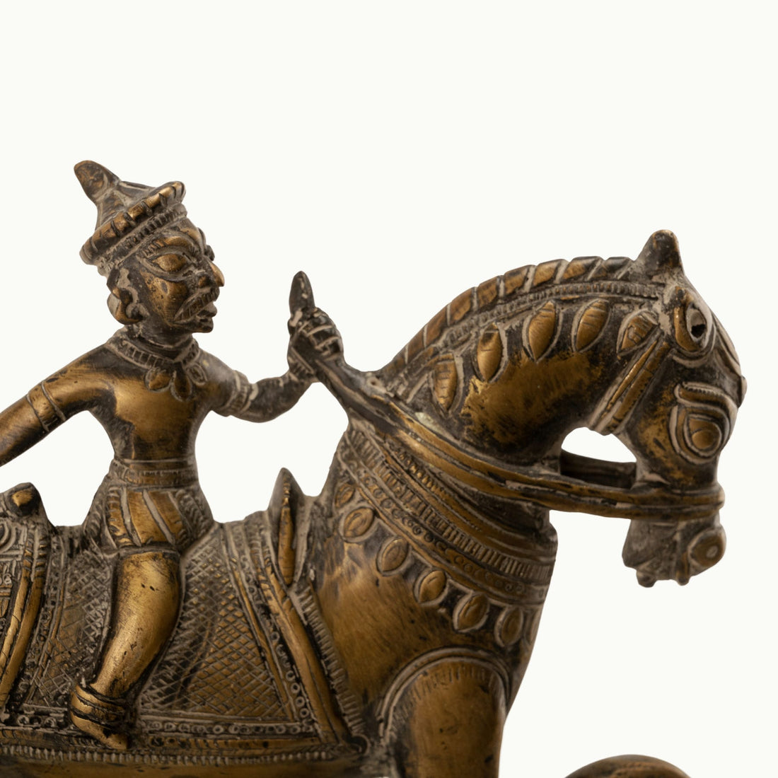 Antique Brass Horse Nutcracker showing mechanical grandeur on a living room coffee table. 